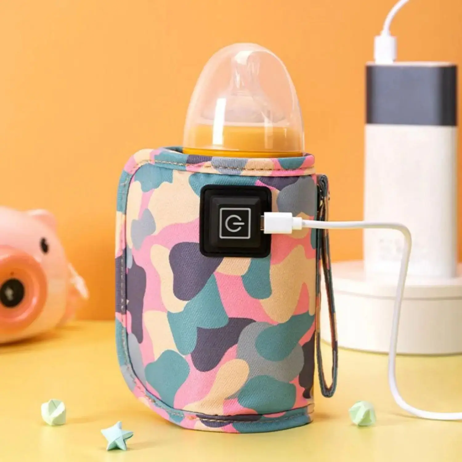 Pochette isotherme pour biberons avec chauffe-biberon USB intégré.