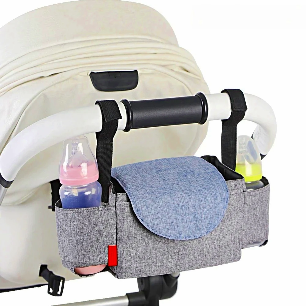 Pochette à couches, isotherme pour biberons, de rangement pour maman.