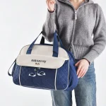 Sac bandoulière brodé avec poche isotherme